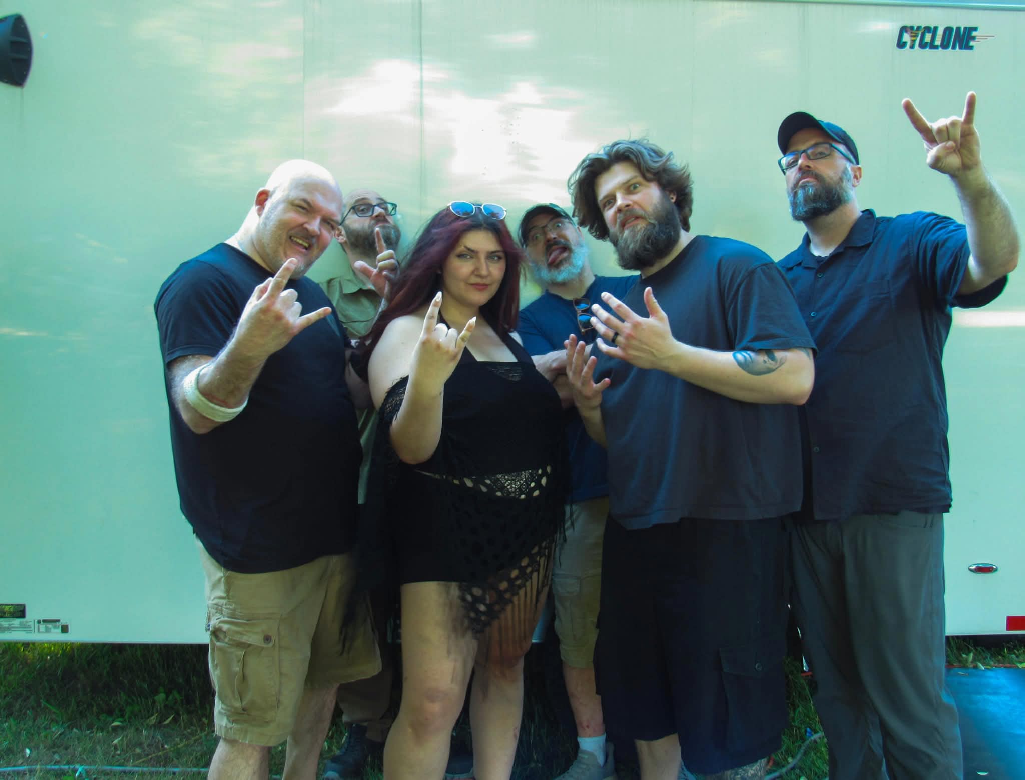 War on the Horizon throwing horns, candid